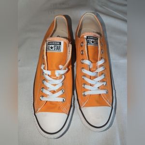 Converse low top orange shoes, men's size 9 women's 11